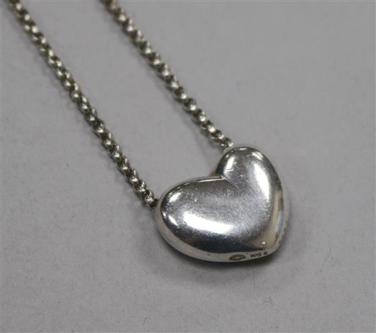 A George Jensen sterling silver heart pendant on chain, numbered 2009, in Georg Jensen box.